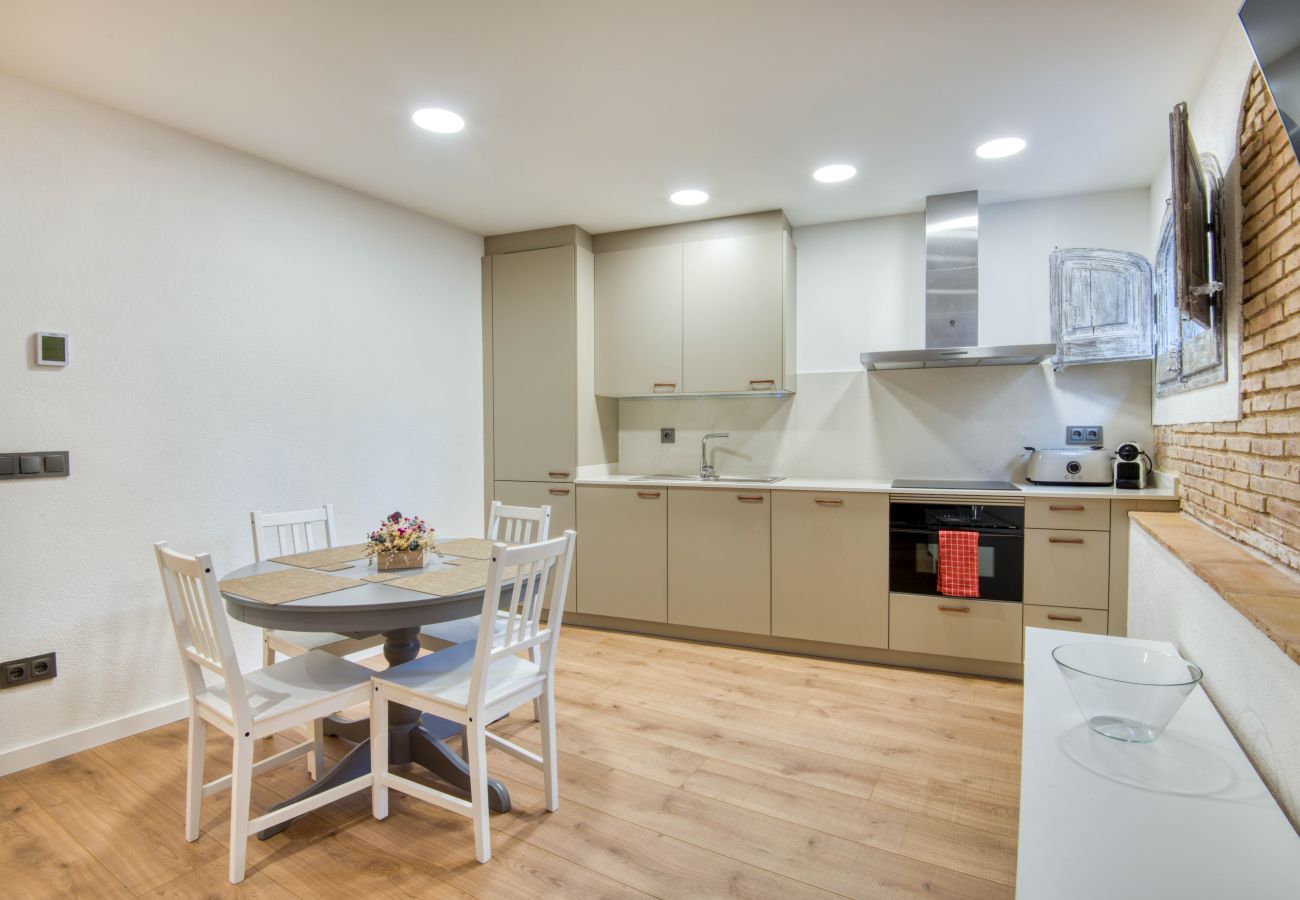 Ferienwohnung in Caldes de Malavella - PATI BLAU 2