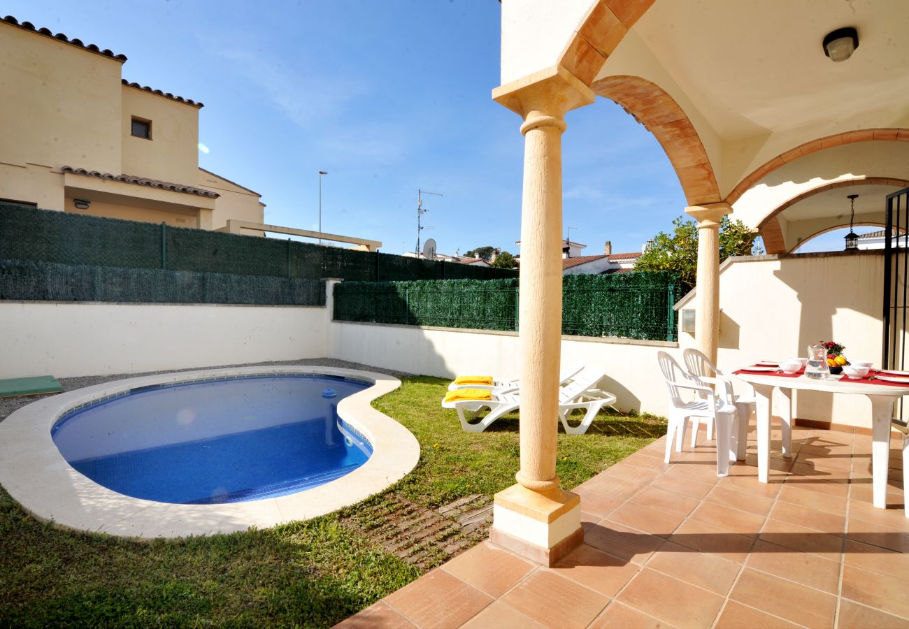 Outdoor area with swimming pool on the Costa Brava