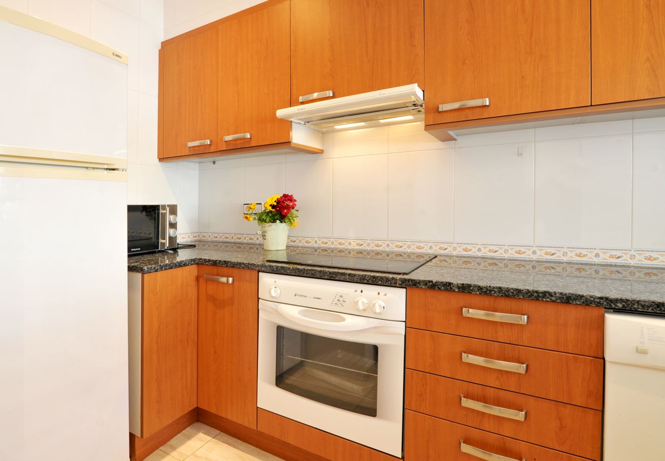 fully equipped kitchen with appliances