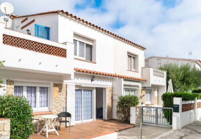 Escala - House